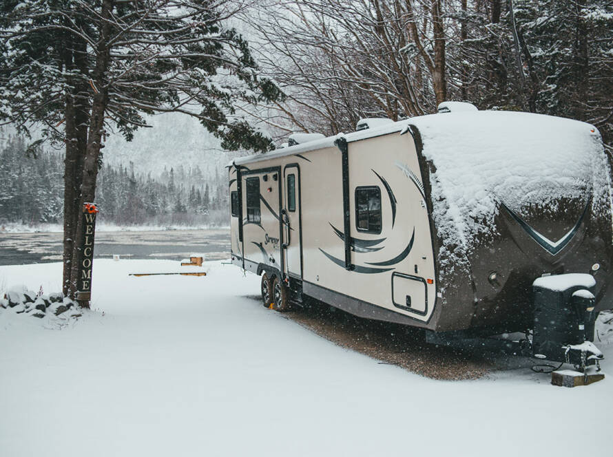 Camper Trailer RV with Snow