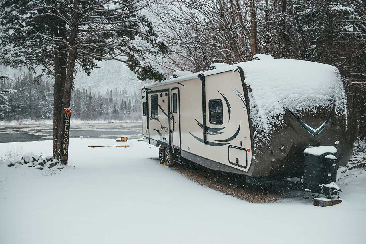 Camper Trailer RV with Snow