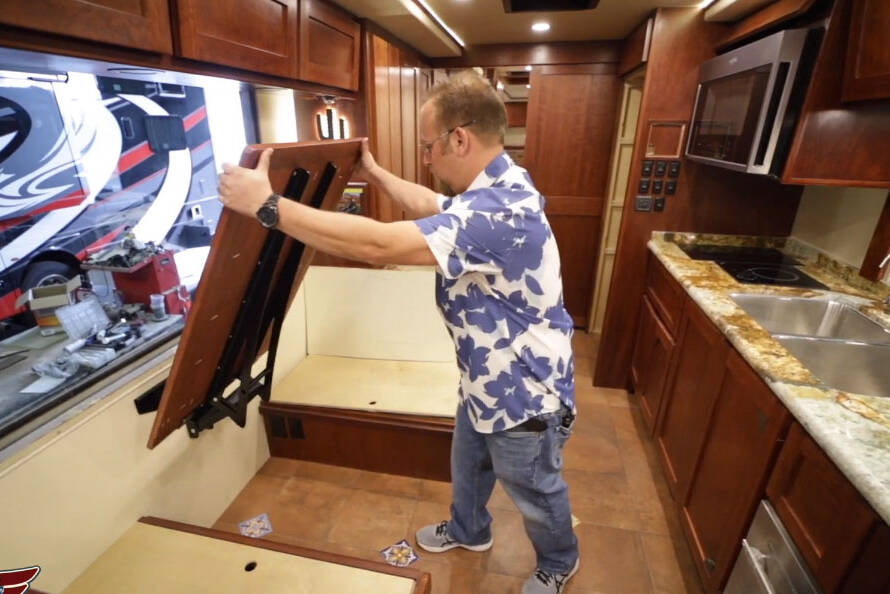 MCI Bus Conversion - Stow Away Table