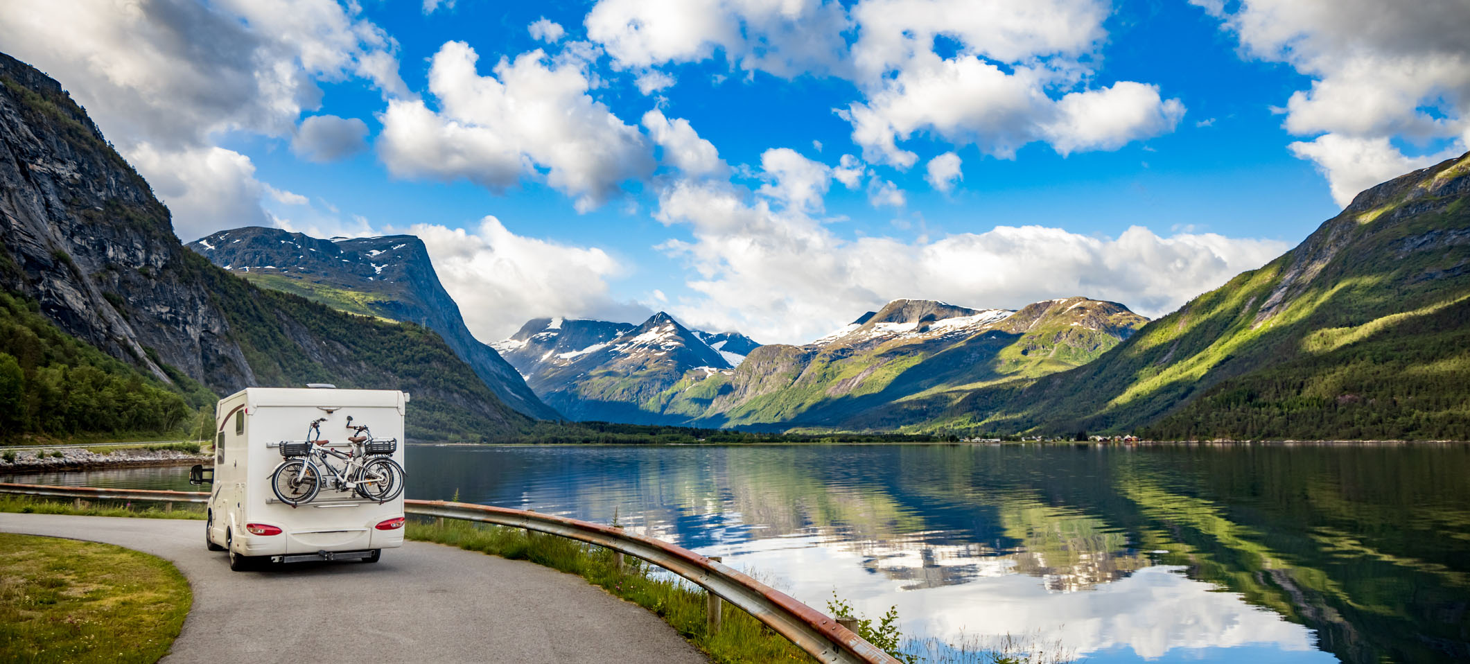 Family vacation travel RV, holiday trip in motorhome, Caravan car Vacation. Beautiful Nature Norway natural landscape.