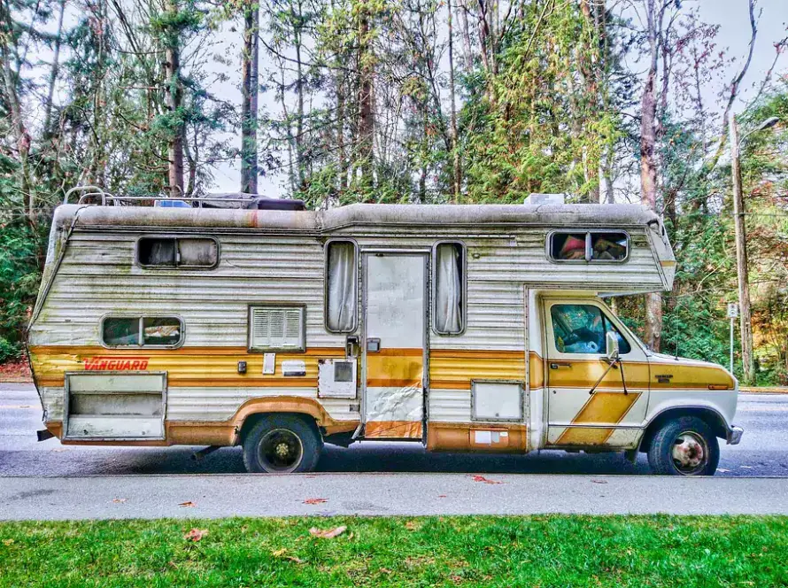 Vintage Vanguard Class C RV in need of maintenance.