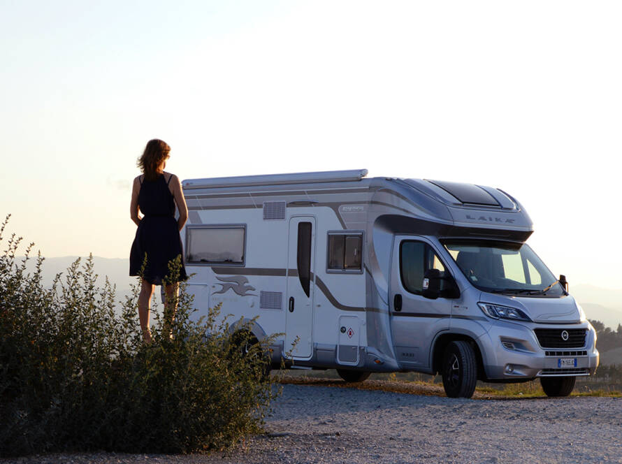 Lady looking at Class B RV